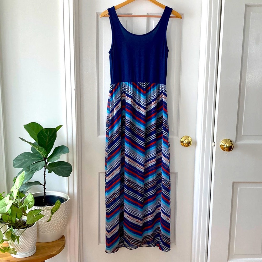 Francesca’s flowy maxi dress with gold back zip